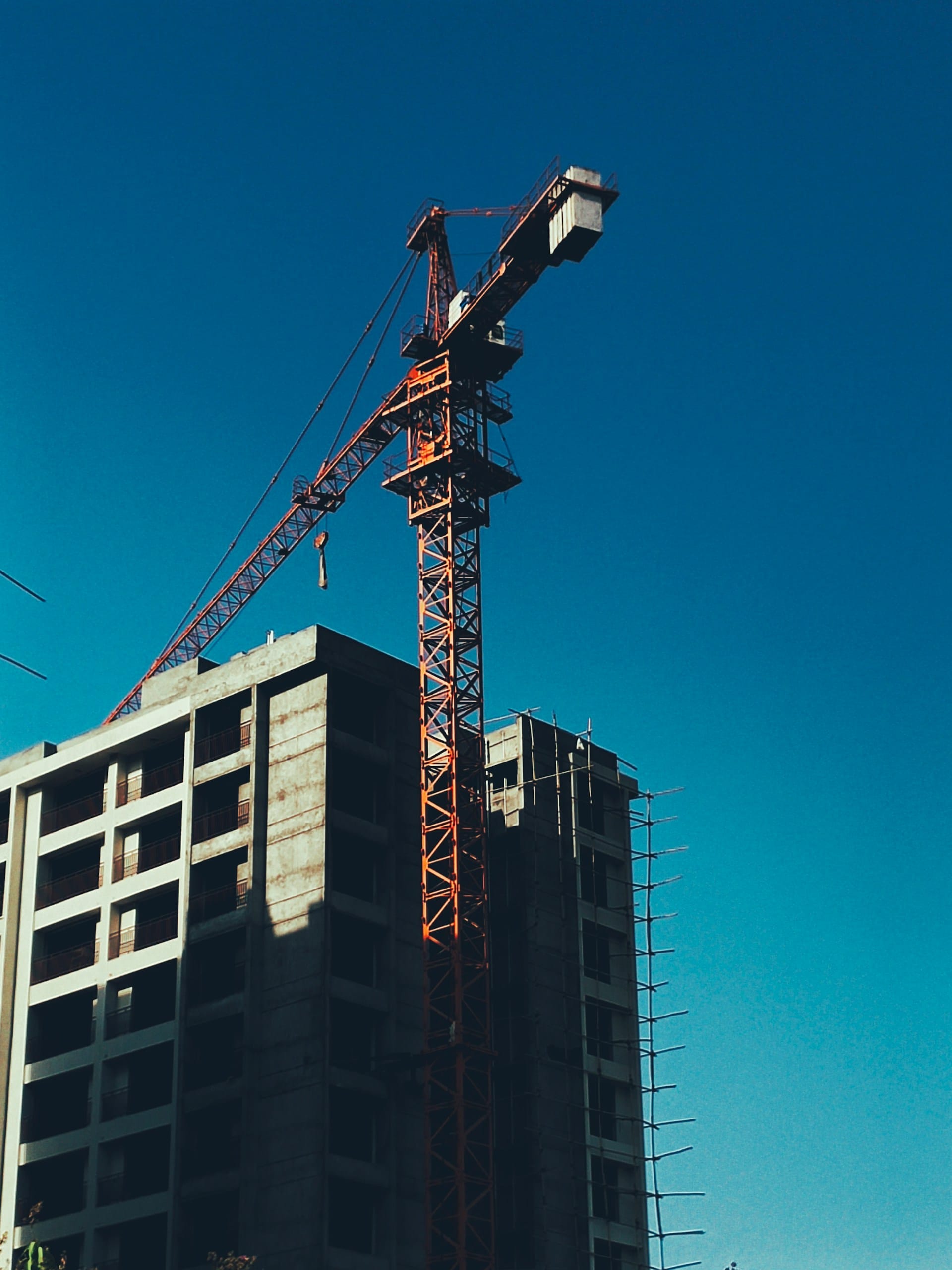Red Crane A red crane on a building site
